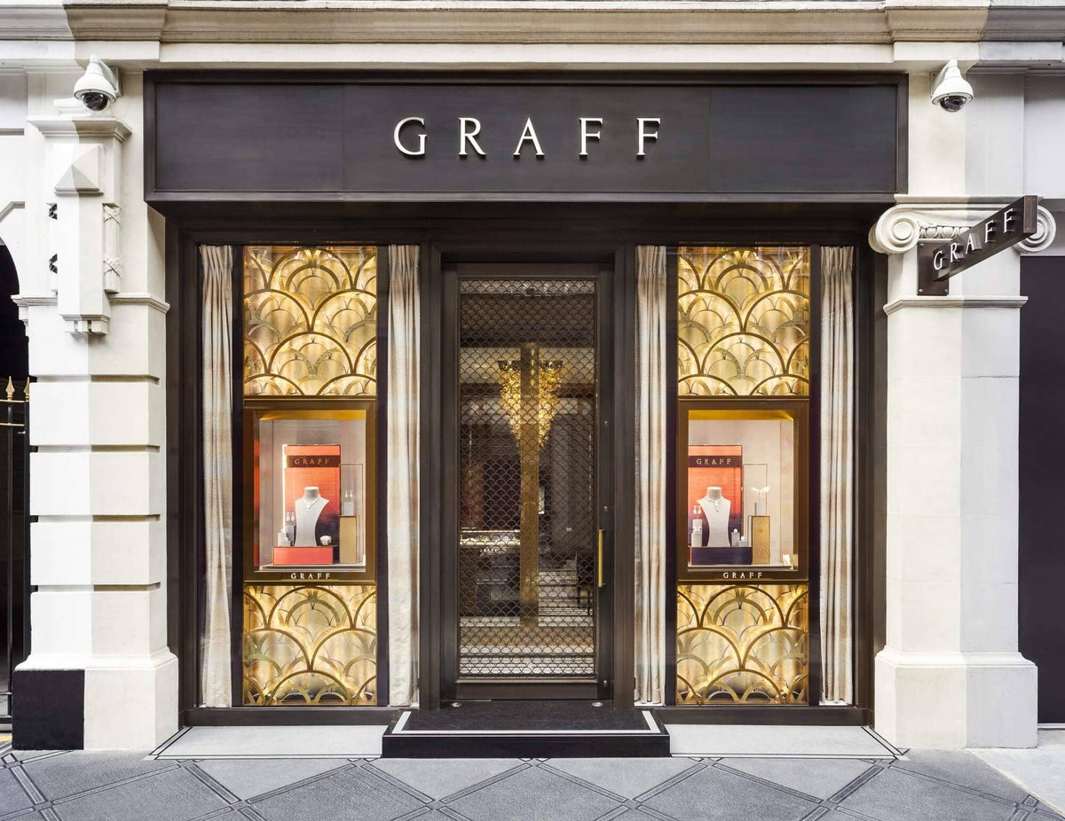 Graff jewelry store front with decorative glass panels and 'GRAFF' branding.